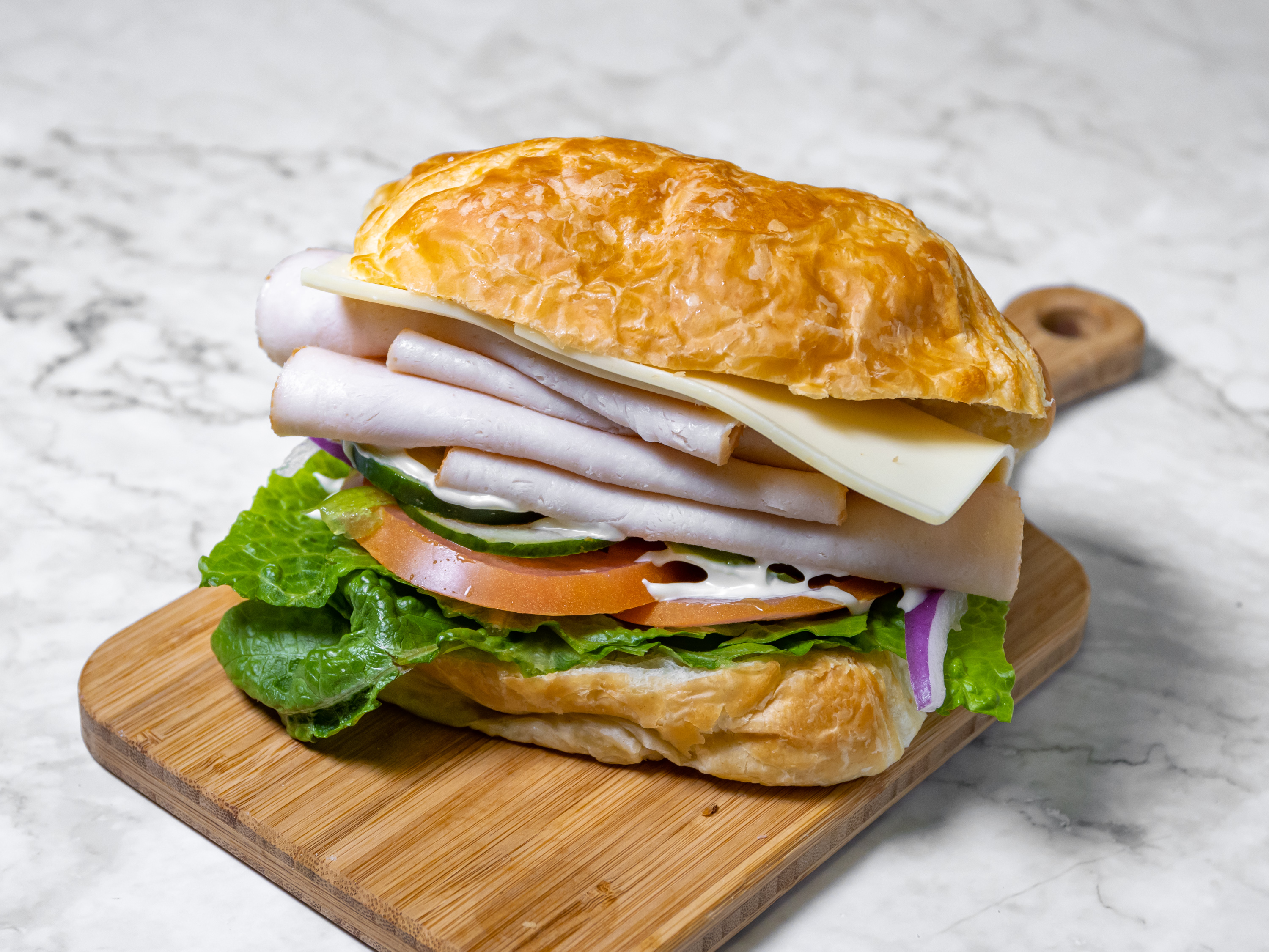 Order Turkey and Cheese Sandwich food online from Master Donuts store, Fontana on bringmethat.com