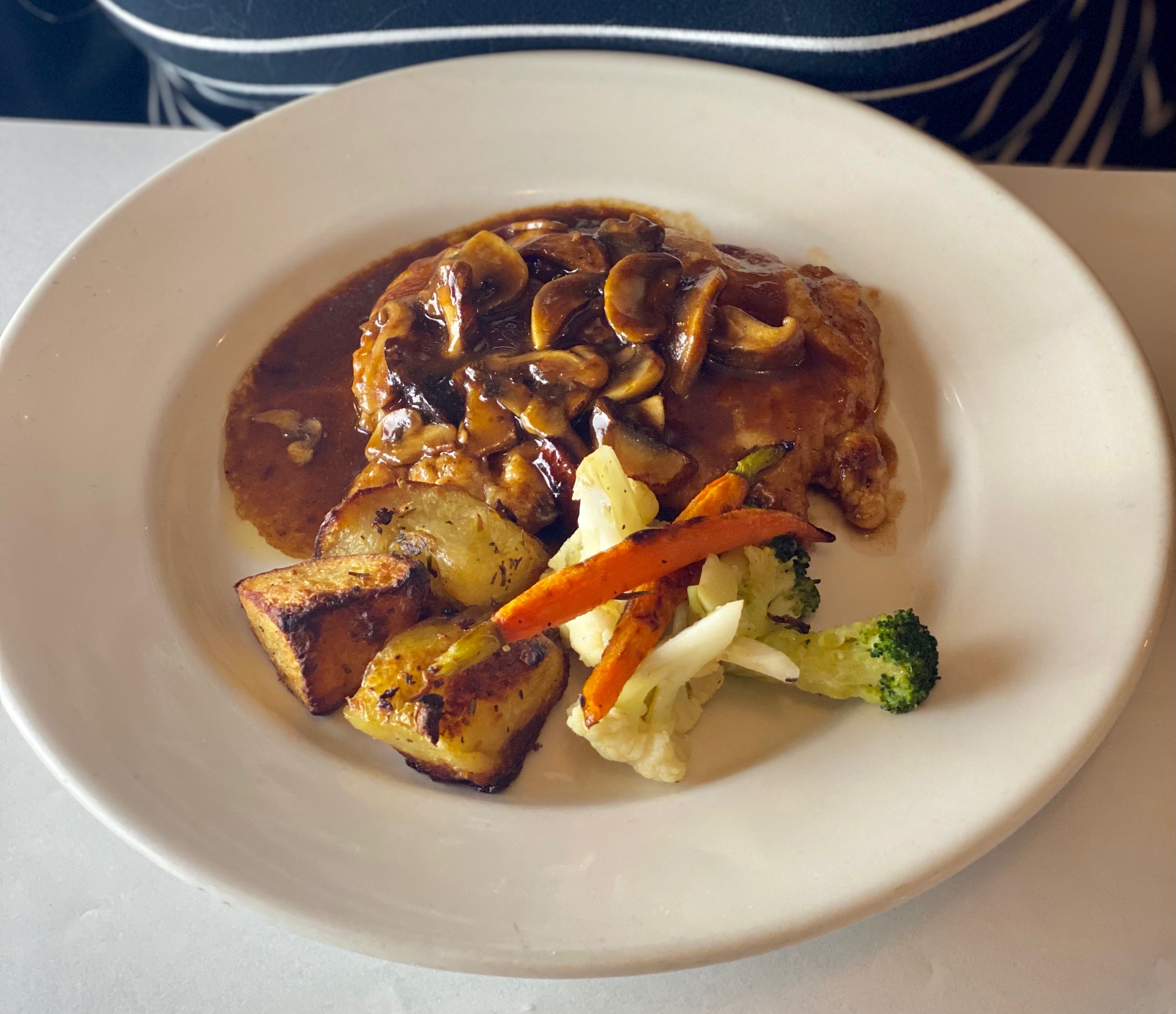 Order Pollo con Funghi food online from Tramonto Bistro store, Malibu on bringmethat.com