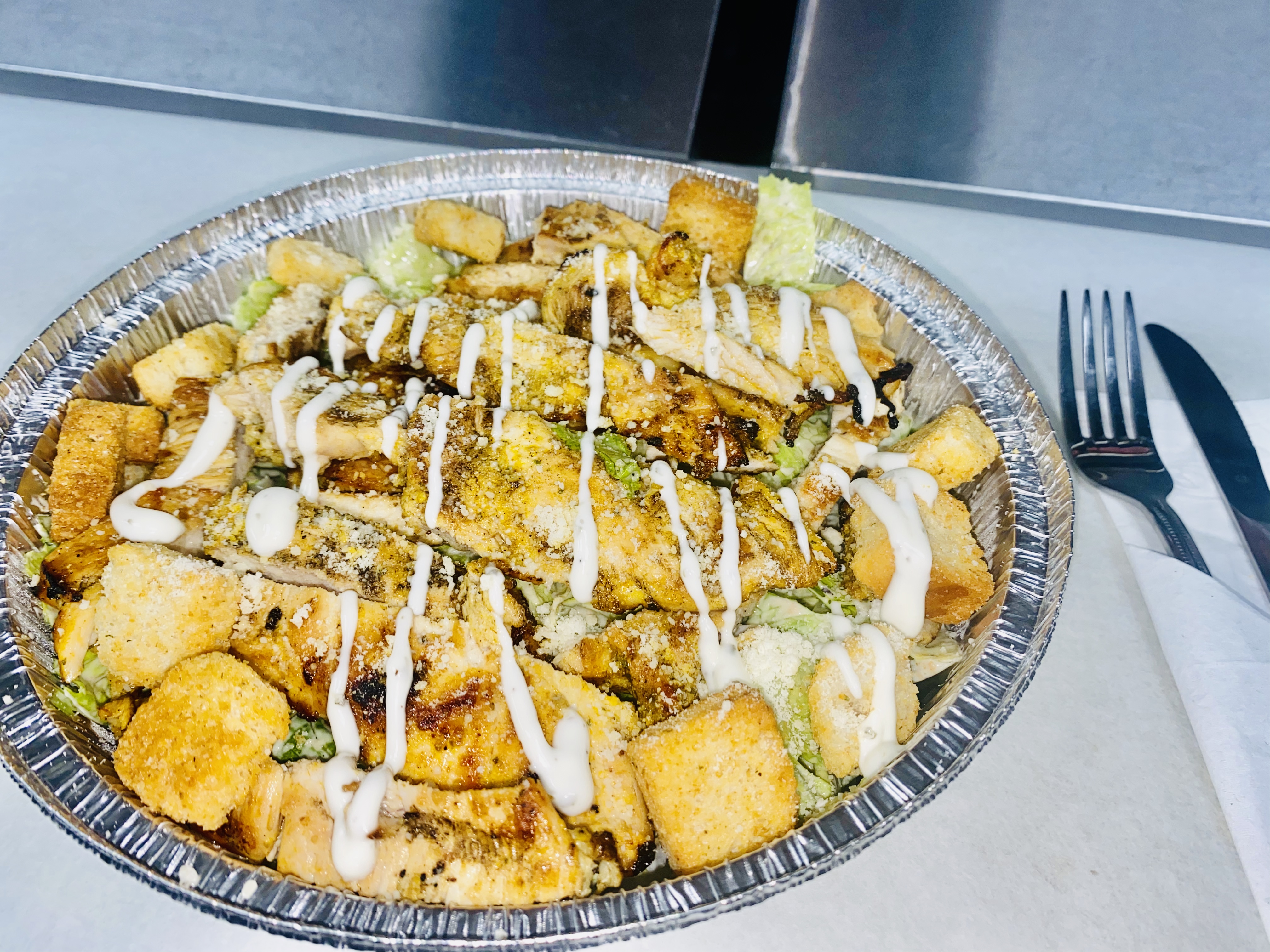 Order Caesar Salad with Grilled Chicken food online from Sabores Latinos Restaurant & Bakery Corp. store, Richmond Hill on bringmethat.com