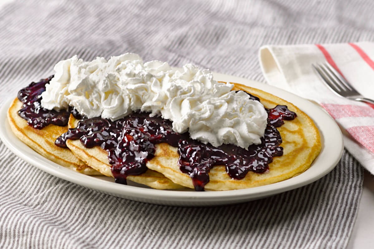 Order Buttermilk Pancakes with Fruit Toppings food online from Cracker Barrel store, Rochester on bringmethat.com