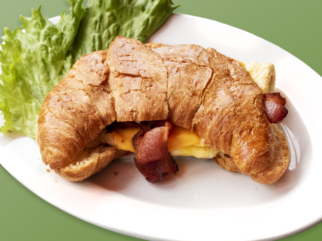 Order 14 Croissant con huevo y tocineta food online from Cositas Ricas Corp store, Queens on bringmethat.com