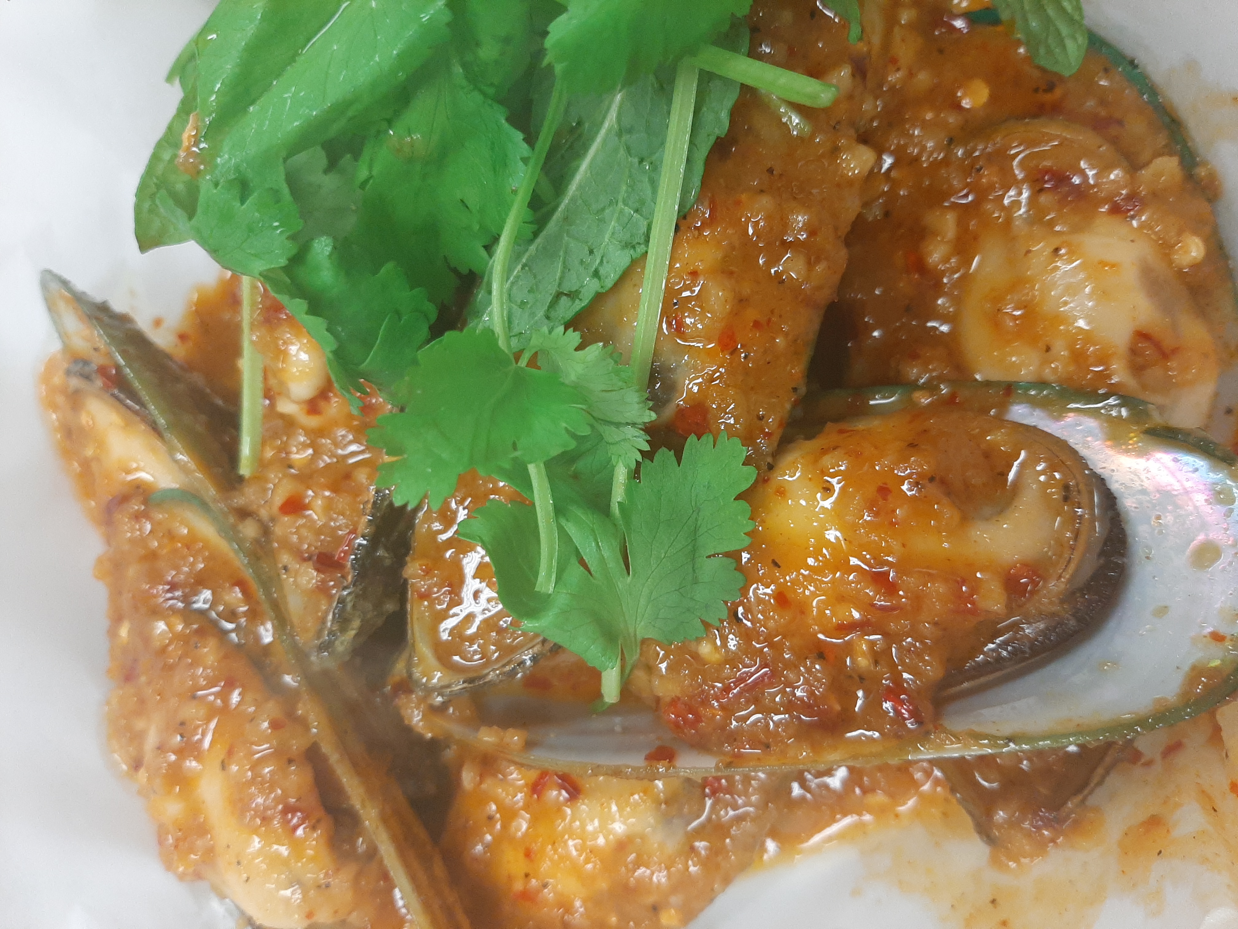 Order Mussel food online from Em Kajun Asian Cuisine store, Haltom City on bringmethat.com