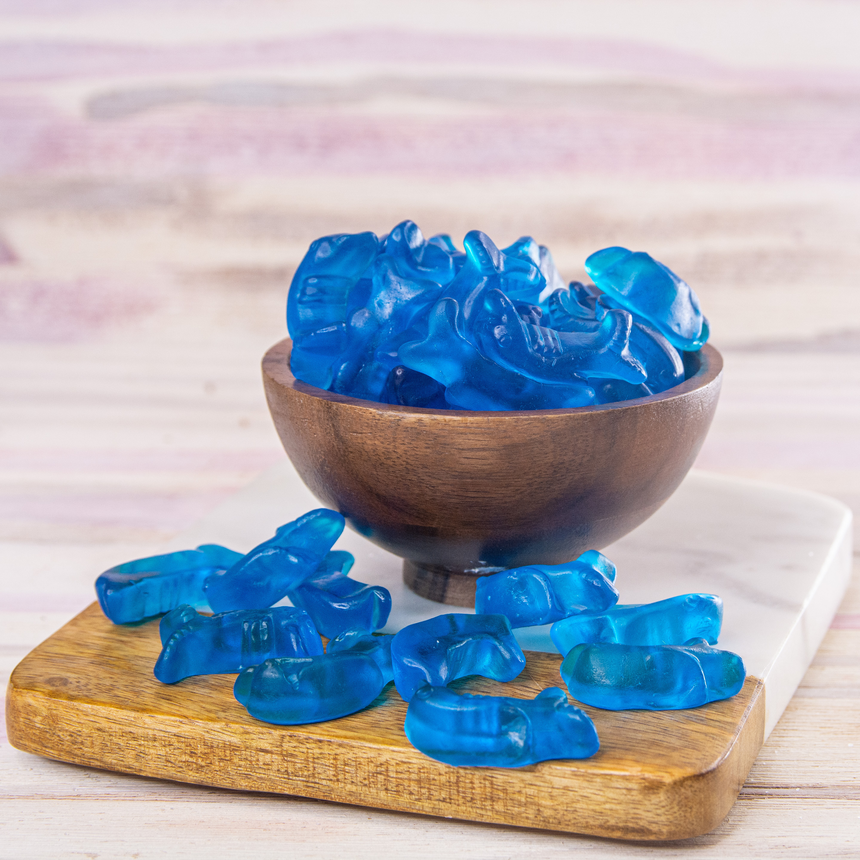 Order Gummi Blue Raspberry Dolphins food online from Wockenfuss Candies store, Columbia on bringmethat.com