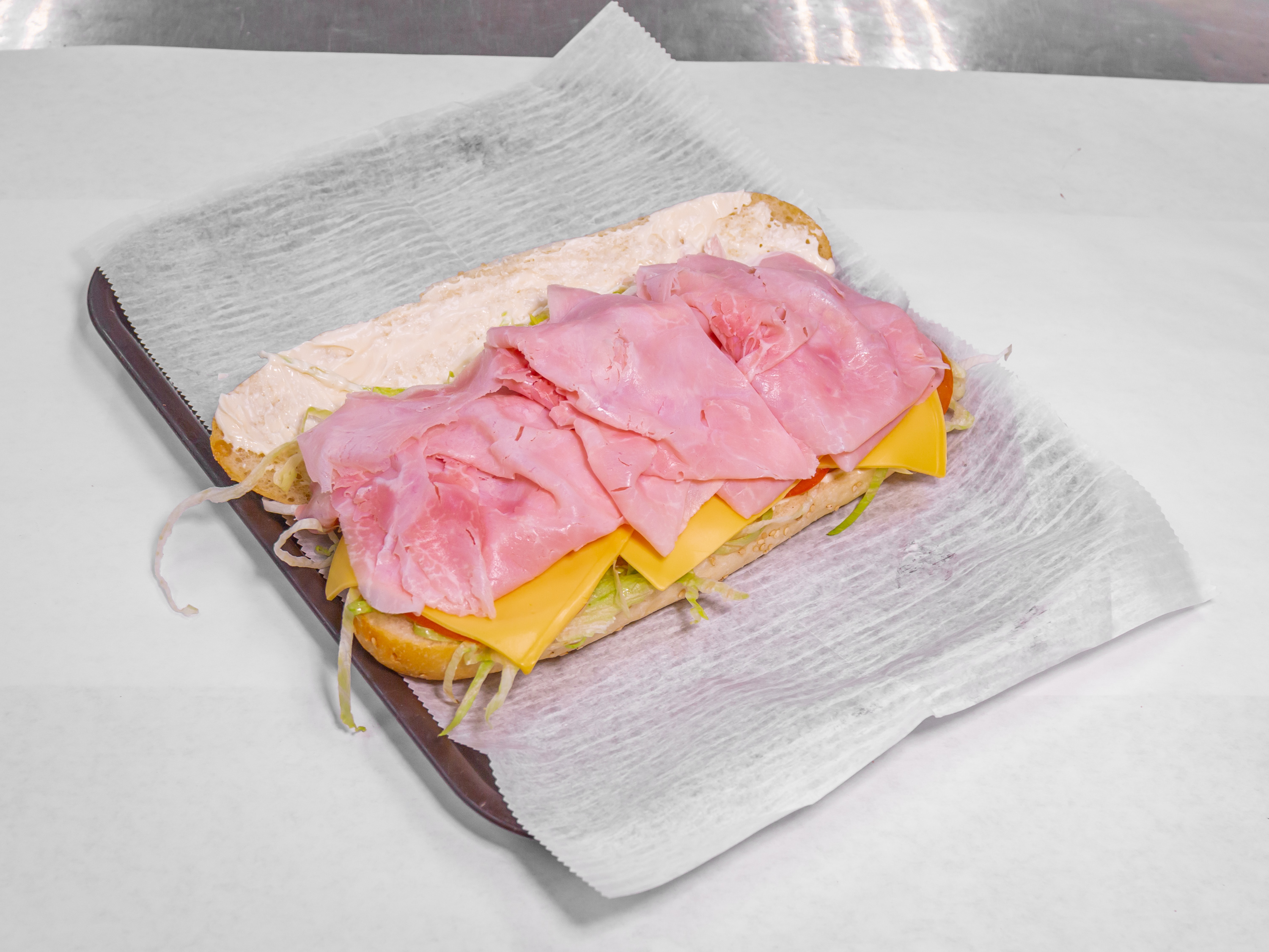 Order Ham & Cheese Sandwich food online from Bay Shore Deli & Grocery store, Bay Shore on bringmethat.com