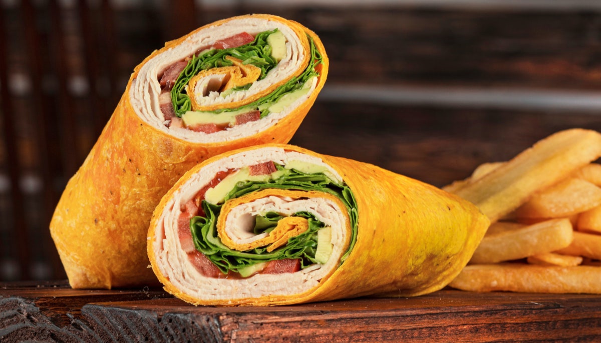 Order TURKEY AVOCADO WRAP food online from Bear's Big Burgers and Wings store, Jupiter on bringmethat.com