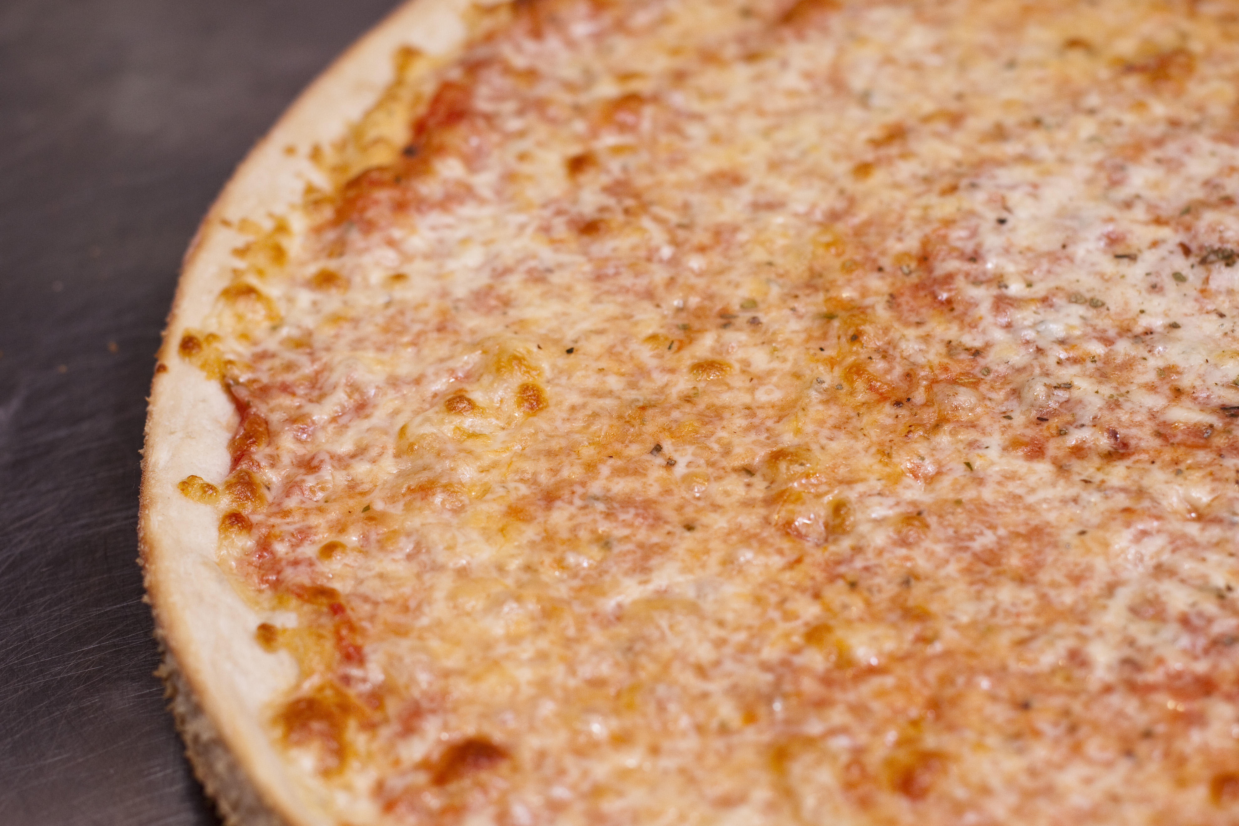 Order Regular 16" Pie food online from Gotham Pizza store, New York on bringmethat.com