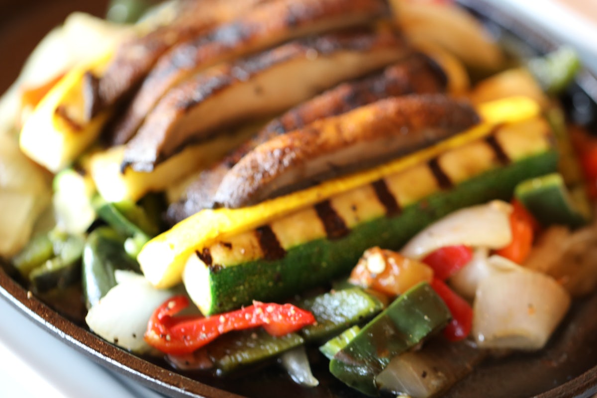 Order Grilled Vegetable Fajitas for One food online from Uncle Julio's store, Brentwood on bringmethat.com