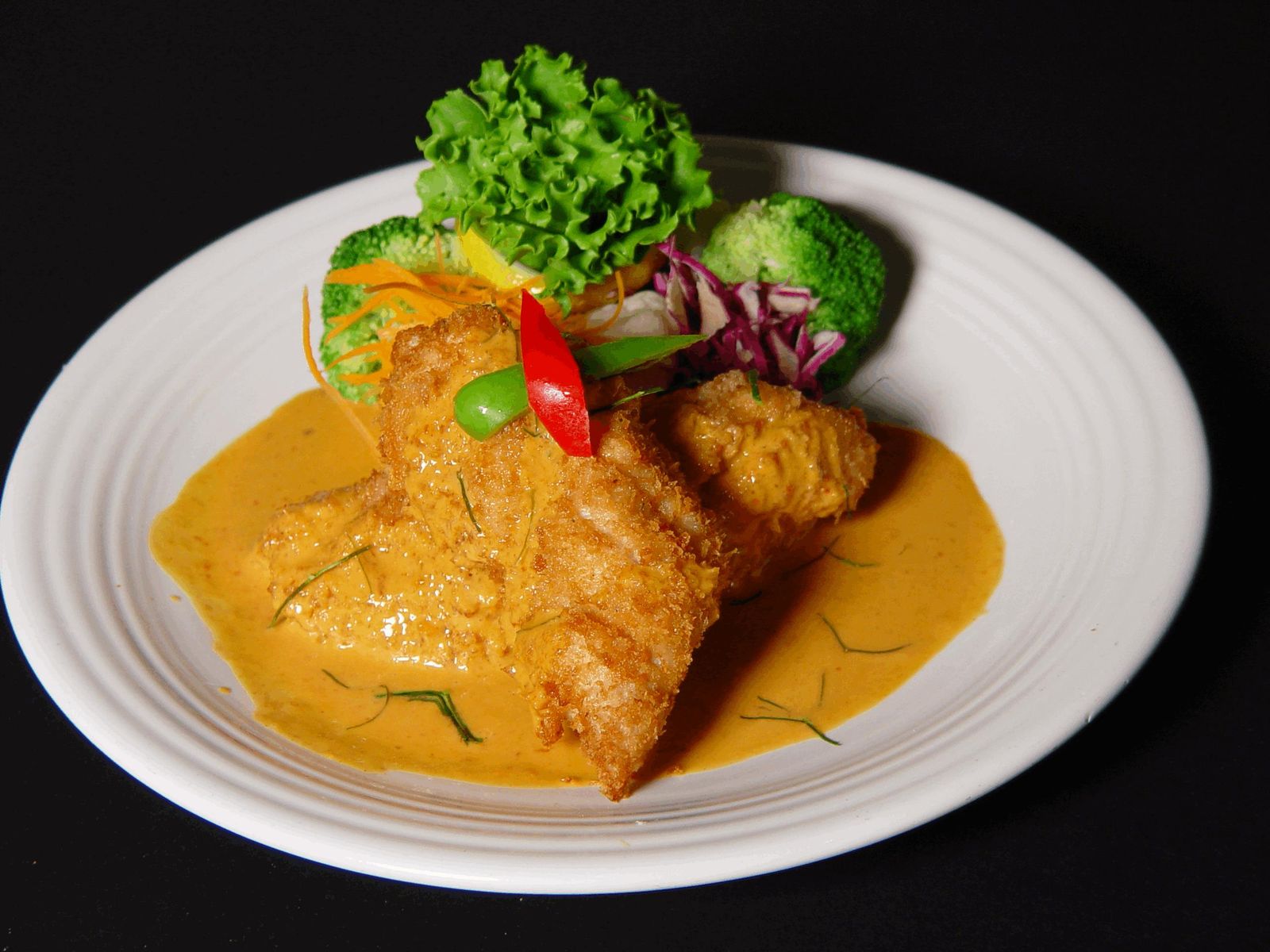 Order * Thai Catfish food online from Racha Thai store, Seattle on bringmethat.com