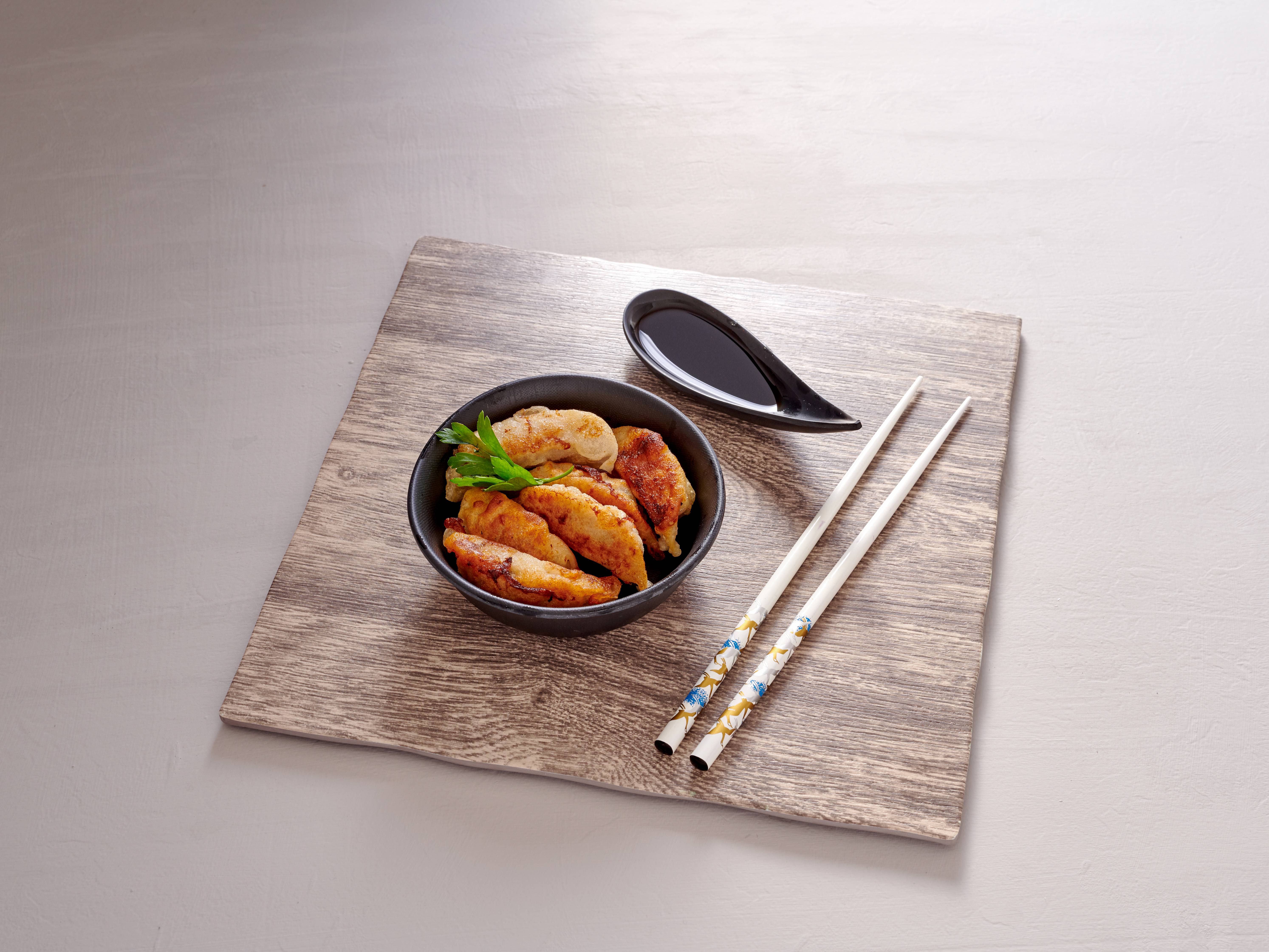 Order 6 Pieces Gyoza food online from Ichiban Sushi & Ramen store, Arlington on bringmethat.com