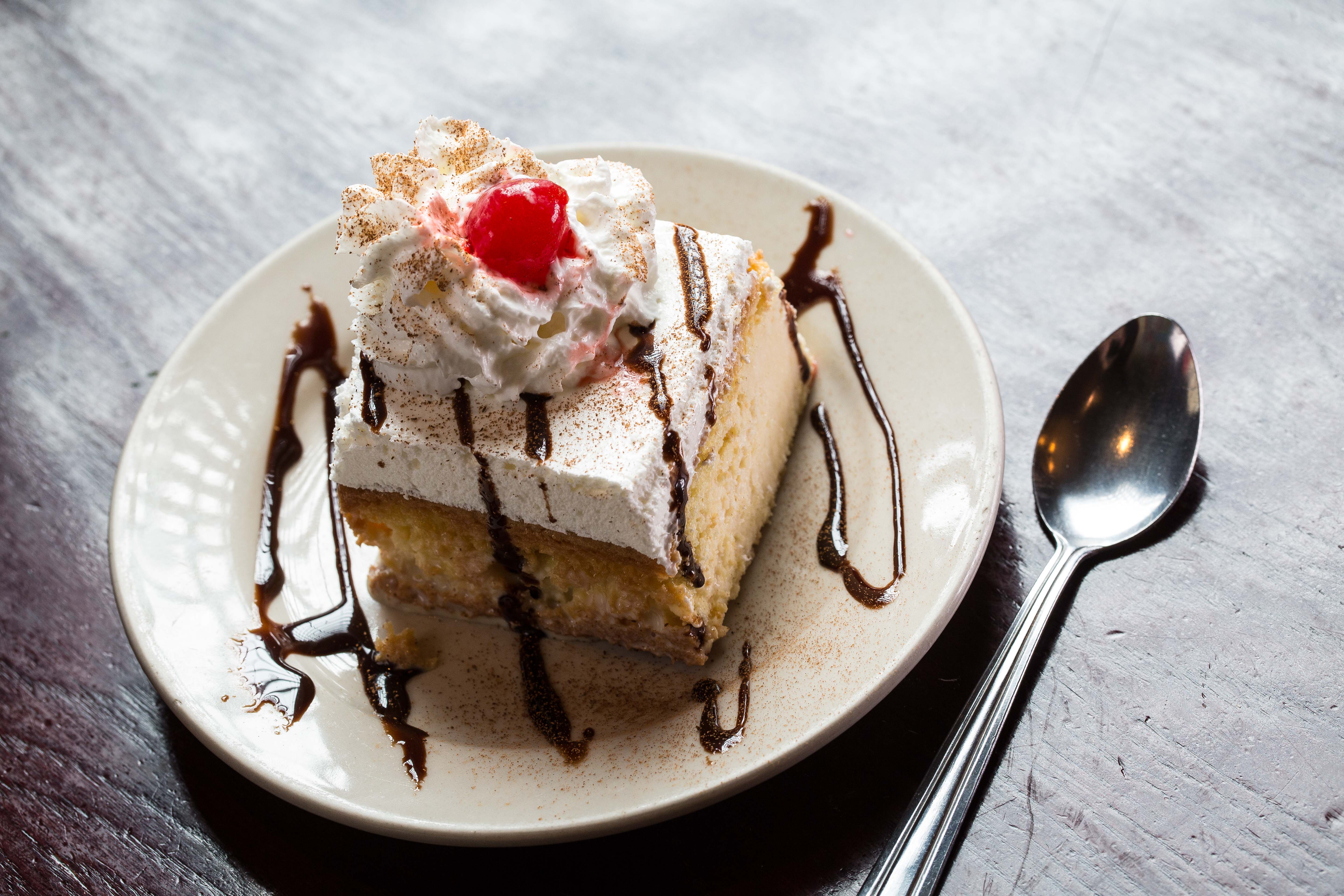 Order Tres Leches food online from Riko Peruvian Cuisine store, Queens on bringmethat.com
