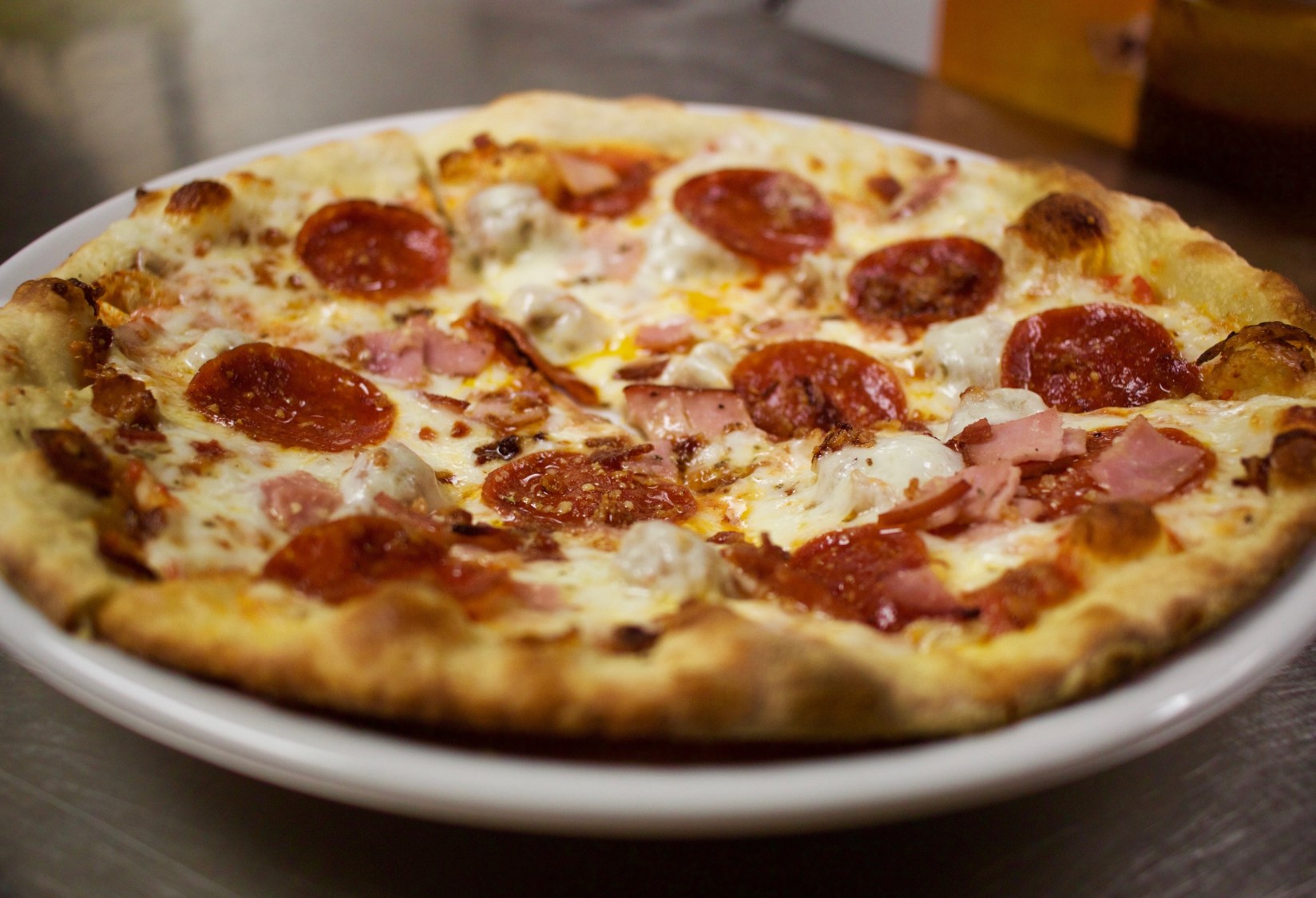 Order Meat Lovers Pizza food online from Pub By Novo store, Bowling Green on bringmethat.com
