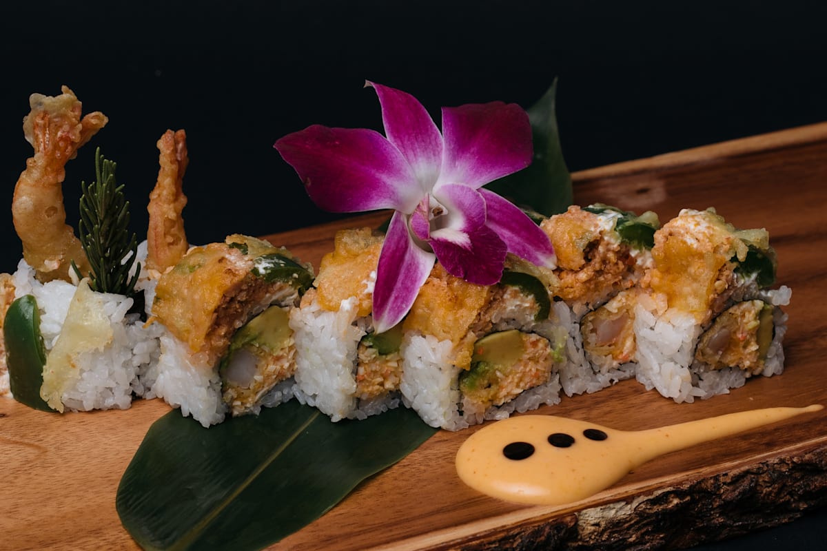 Premium Photo  Sushi set philadelphia roll california unagi black dragon  with fresh ingredients