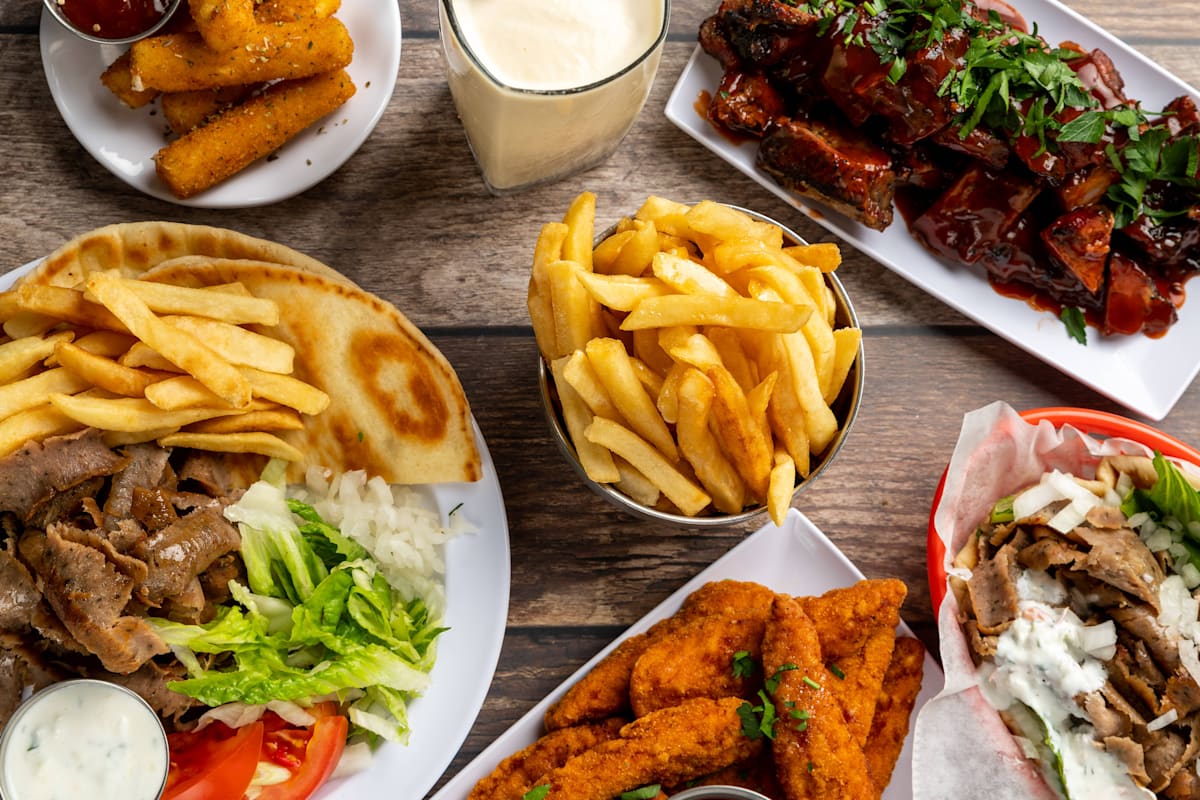 Uptown Pizza & BBQ Delivery Menu Order Online 1031 W Wilson Ave