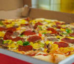 Order Deluxe Pizza food online from Mancini's New York Deli & Pizzeria store, Fayetteville on bringmethat.com