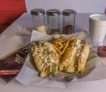 Order Philly Cheesesteak food online from Mancini's New York Deli & Pizzeria store, Fayetteville on bringmethat.com