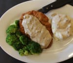 Order Country Fried Steak with Gravy food online from Kings Family Restaurants store, Harrison City on bringmethat.com