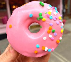 PSA: Costco Is Selling Giant Doughnuts Topped With Pink Icing and