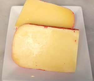 Maple Leaf Red Wax Gouda – a sweet, creamy Gouda cheese | Murray's Cheese
