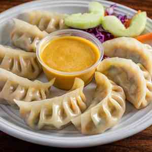Momo Factory Delivery Menu | Order Online | 860 N Orleans St