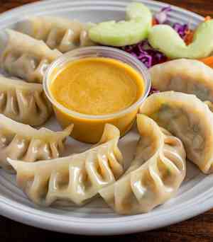 Momo Factory Delivery Menu | Order Online | 860 N Orleans St