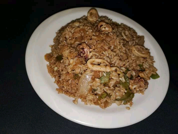 Order Arroz con Calamares food online from La Teresita Restaurant store, Pinellas Park on bringmethat.com