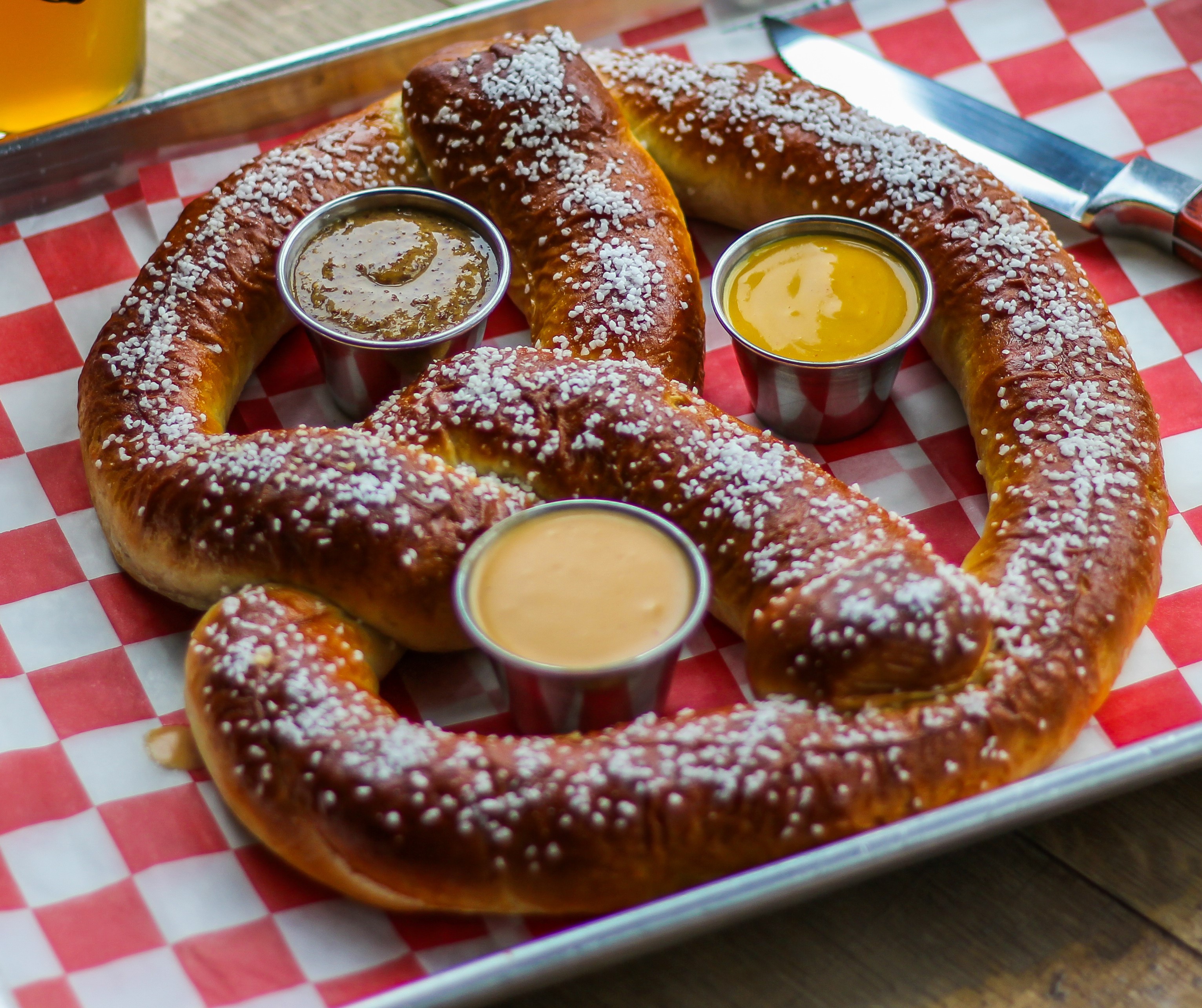 Order Kramer’s Big Ass Pretzel food online from Rebellion On The Pike store, Arlington on bringmethat.com