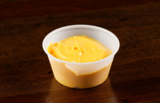 Order Side of Cheese Sauce food online from Circle Tavern store, Elmwood Park on bringmethat.com