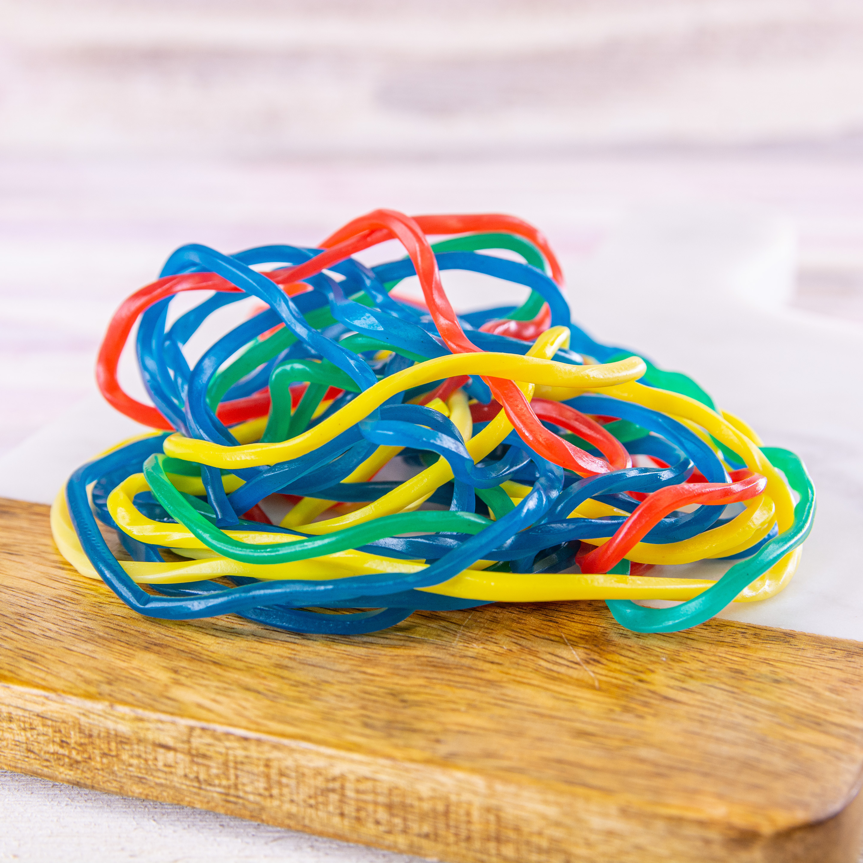 Order Rainbow Shoestring Licorice, 4 Bags food online from Wockenfuss Candies store, Columbia on bringmethat.com