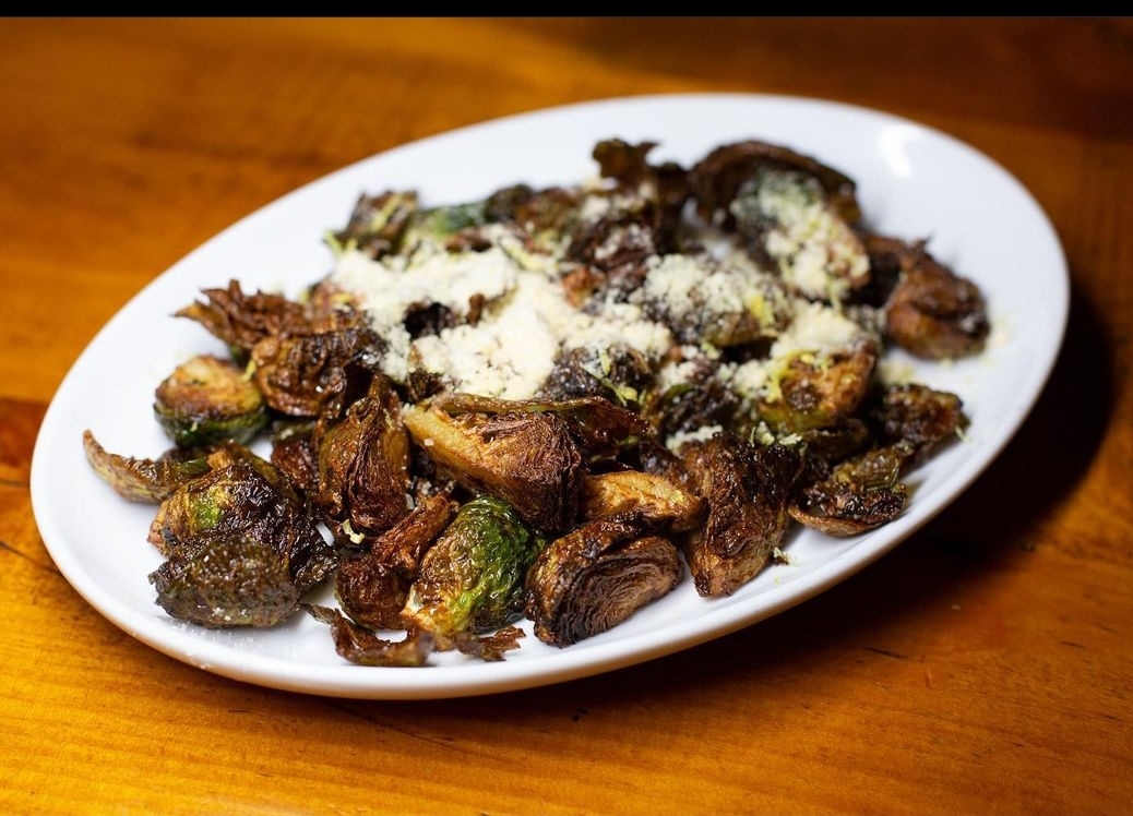 Order Crispy brussel sprouts food online from Viaggio store, Rockville Centre on bringmethat.com