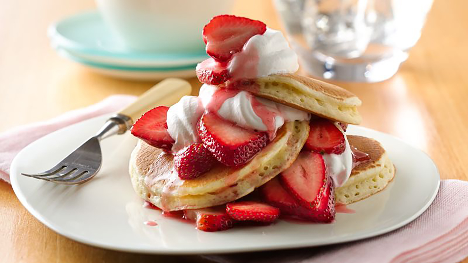 Order Fruit or Nutella Pancake Stack food online from World Cafe store, Orlando on bringmethat.com