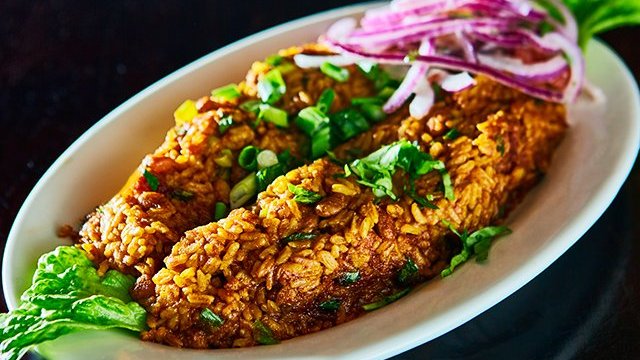 Order Arroz Tacu Tacu food online from Riko Peruvian Cuisine store, Queens on bringmethat.com