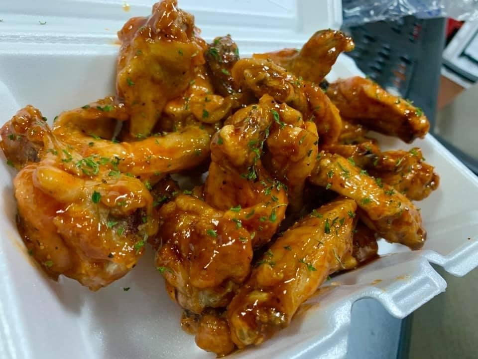 Order Wing Pack food online from Boil Bar Deluxe store, Houston on bringmethat.com