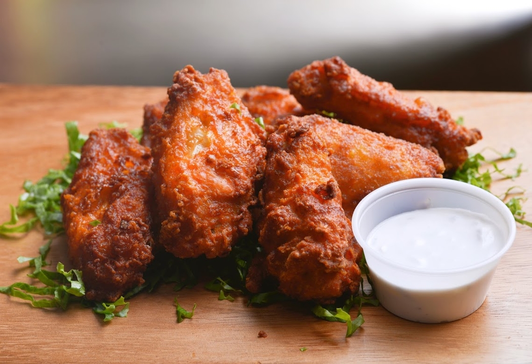 Order Hot & Spicy Chicken Wings food online from Afro Deli store, Saint Paul on bringmethat.com