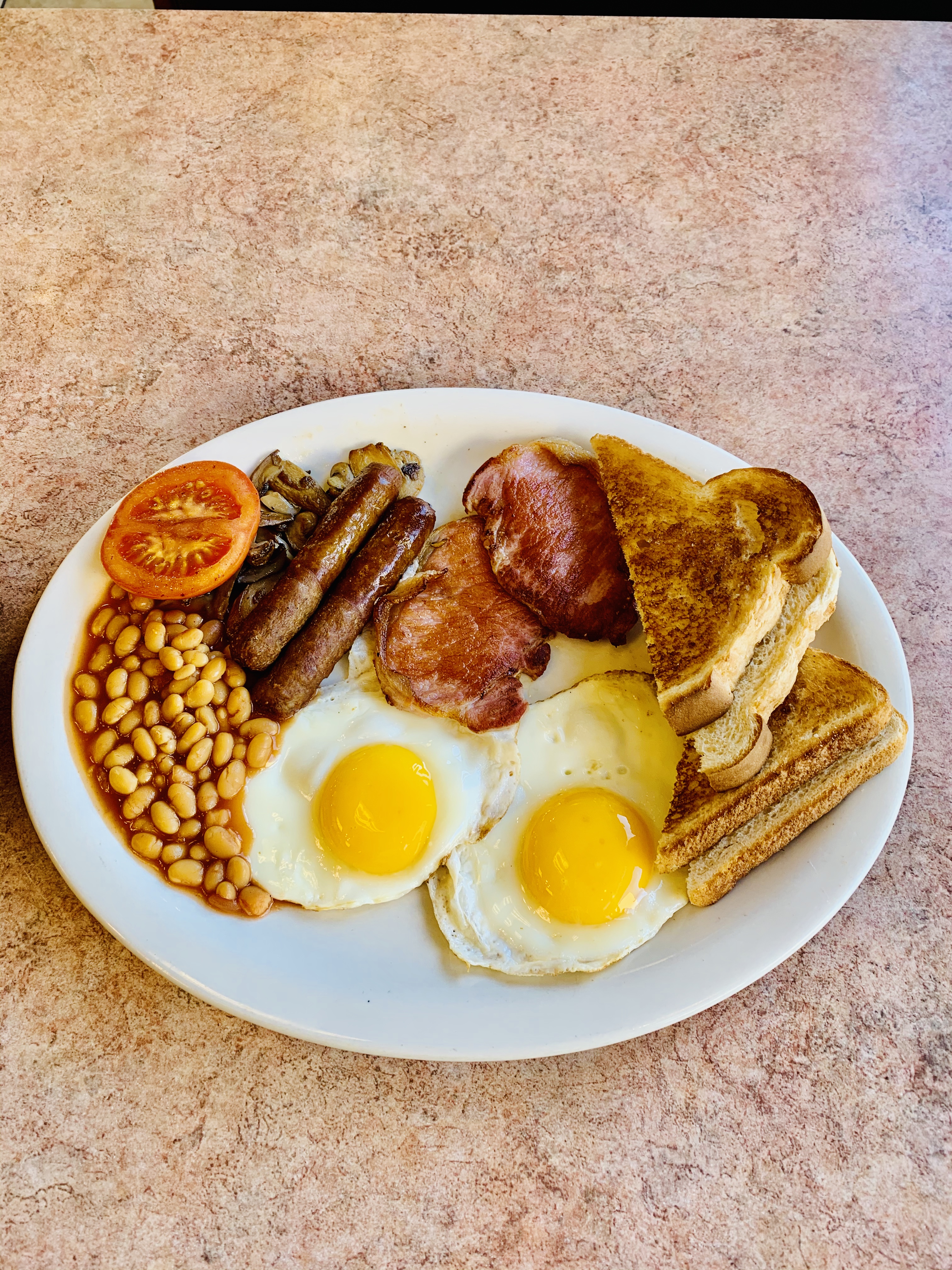 Order Large British Breakfast food online from World Cafe store, Orlando on bringmethat.com