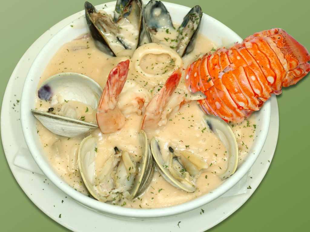 Order 14. Parihuela de Mariscos y Arroz con Coco food online from Cositas Ricas Corp store, Queens on bringmethat.com