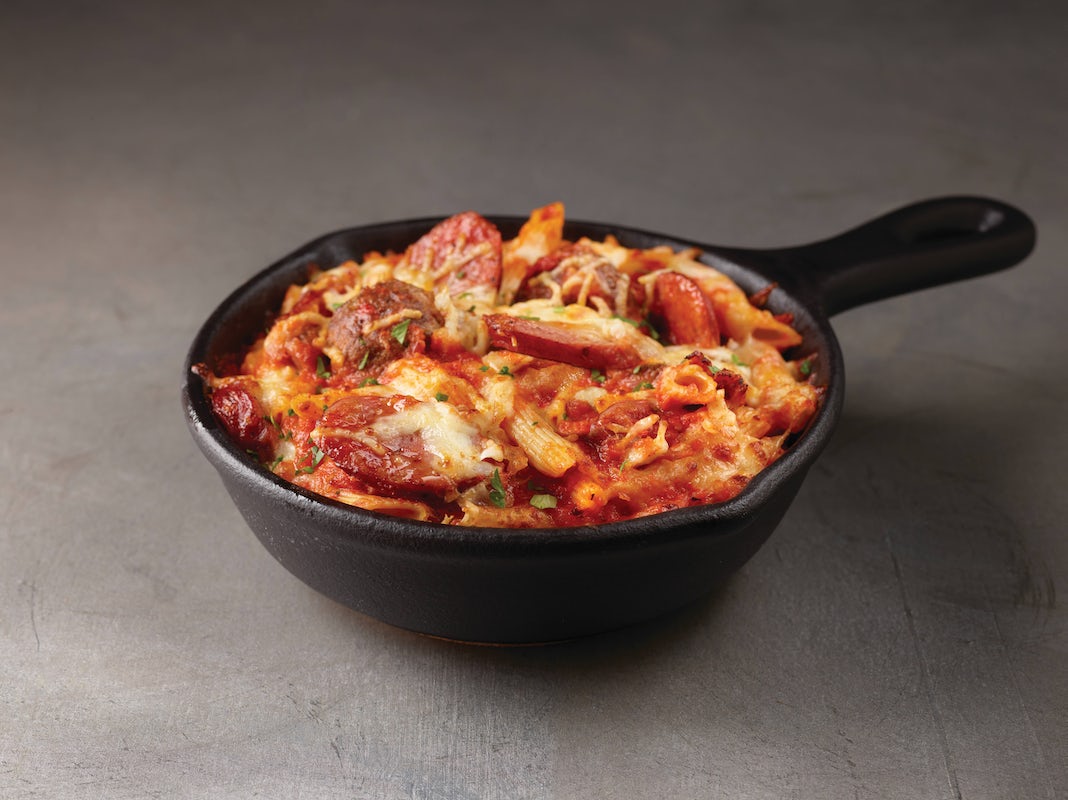 Order Meaty Baked Penne food online from Ruby Tuesday store, Thomasville on bringmethat.com
