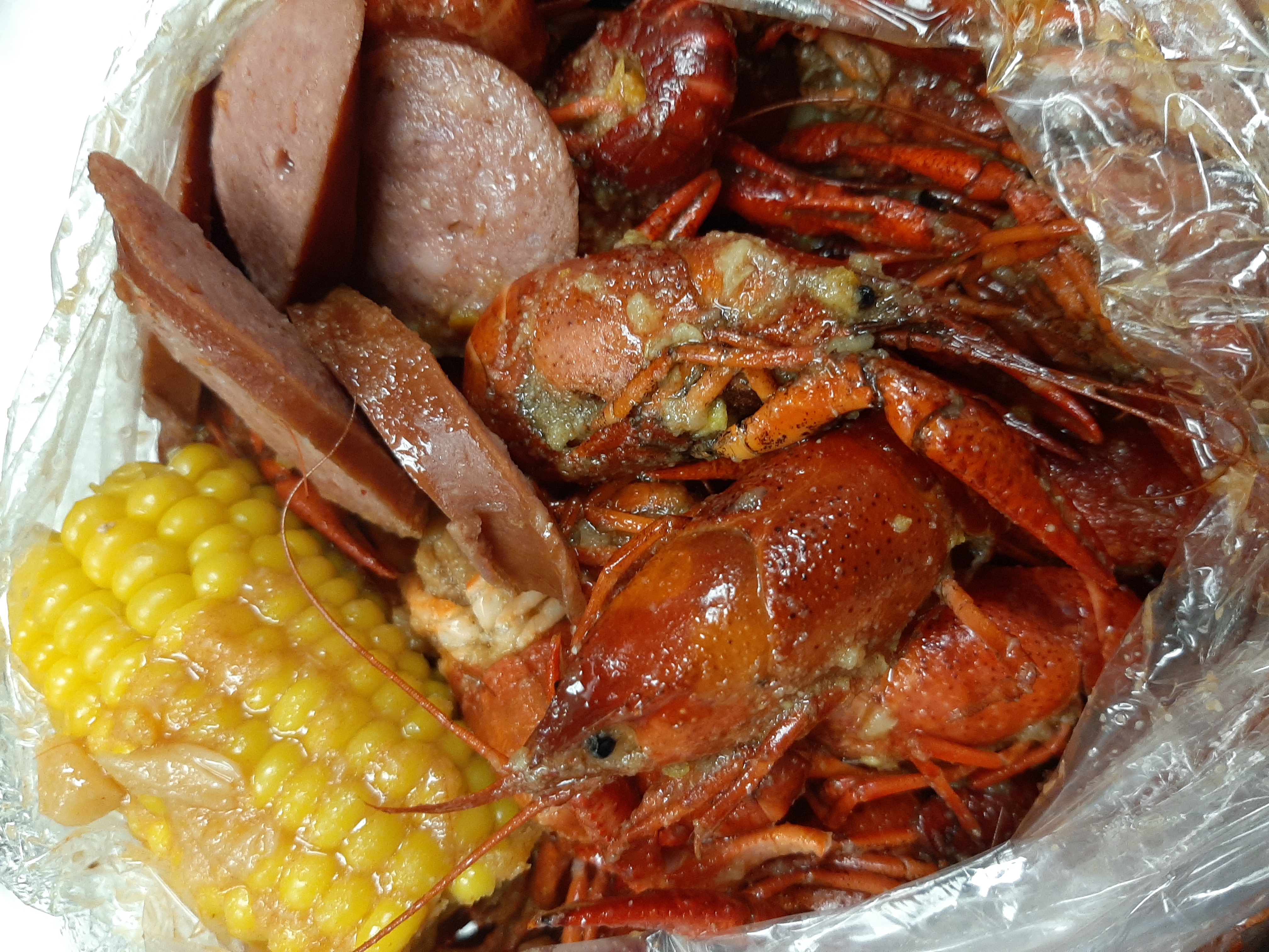 Order Crawfish (5lbs LIVE) food online from Em Kajun Asian Cuisine store, Haltom City on bringmethat.com