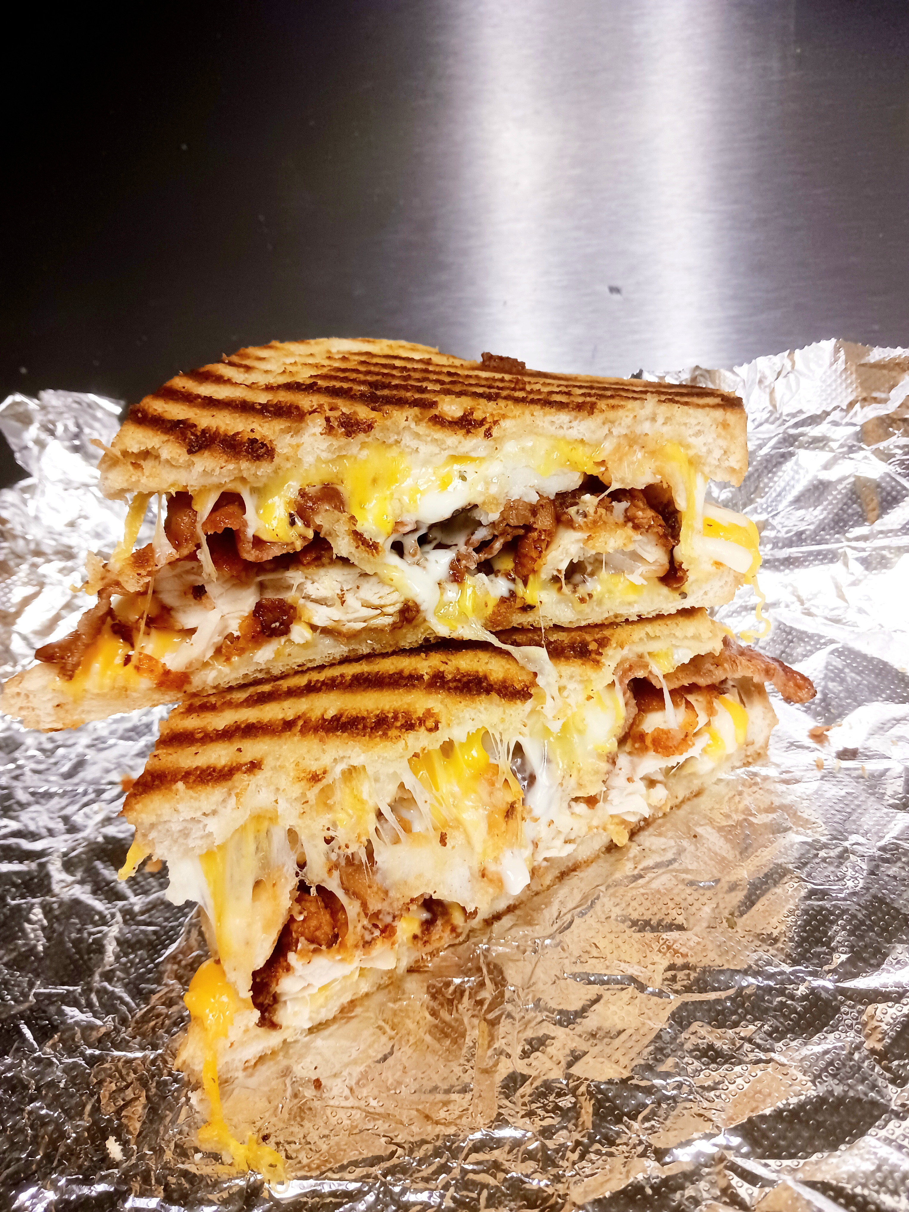 Order THE HANGRY MELT food online from The Grilled Cheese Factory store, Rochester on bringmethat.com