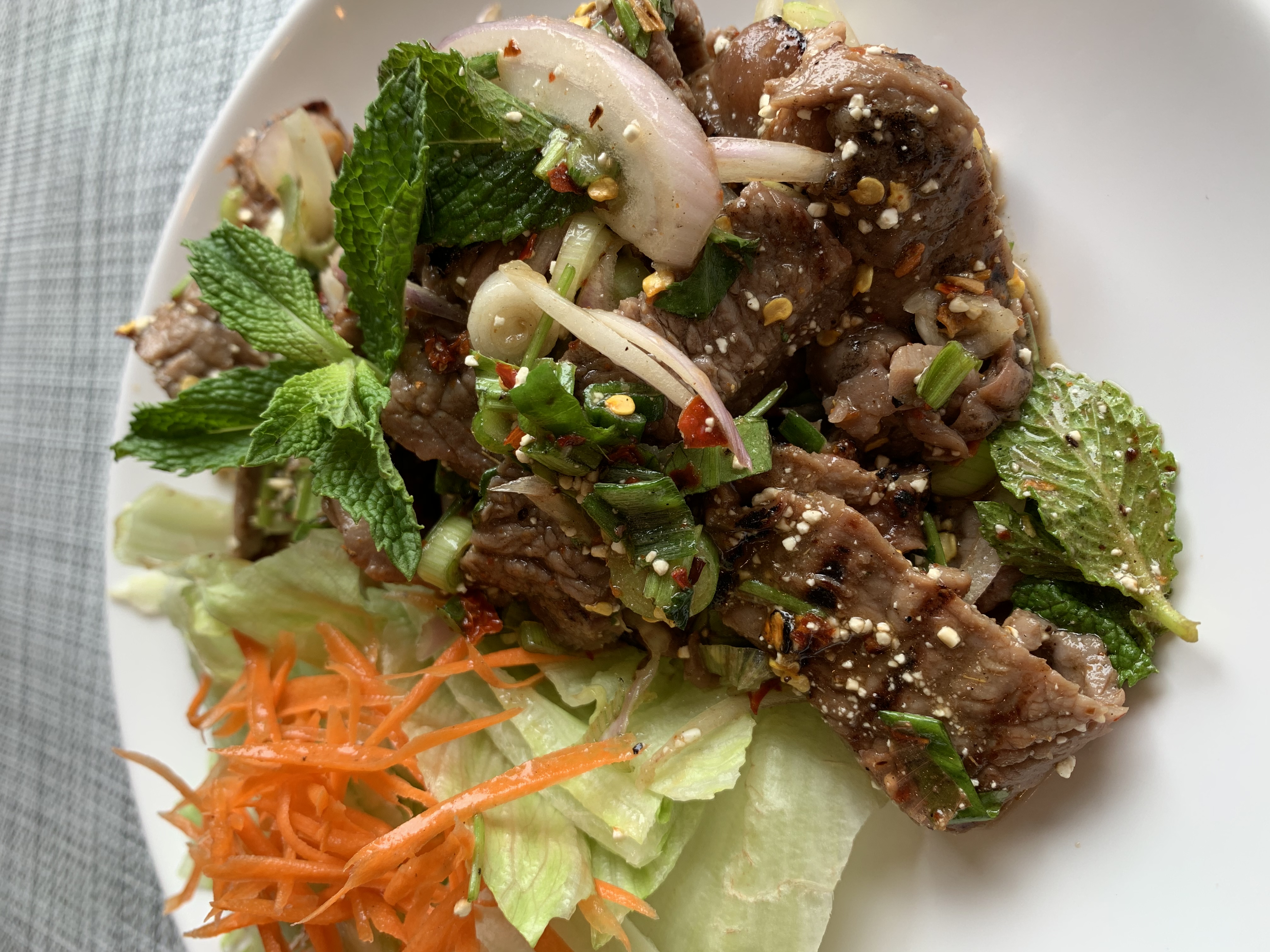 Order Grilled Beef Salad (Nam Tok Neua) food online from R Haan Thai store, Los Angeles on bringmethat.com