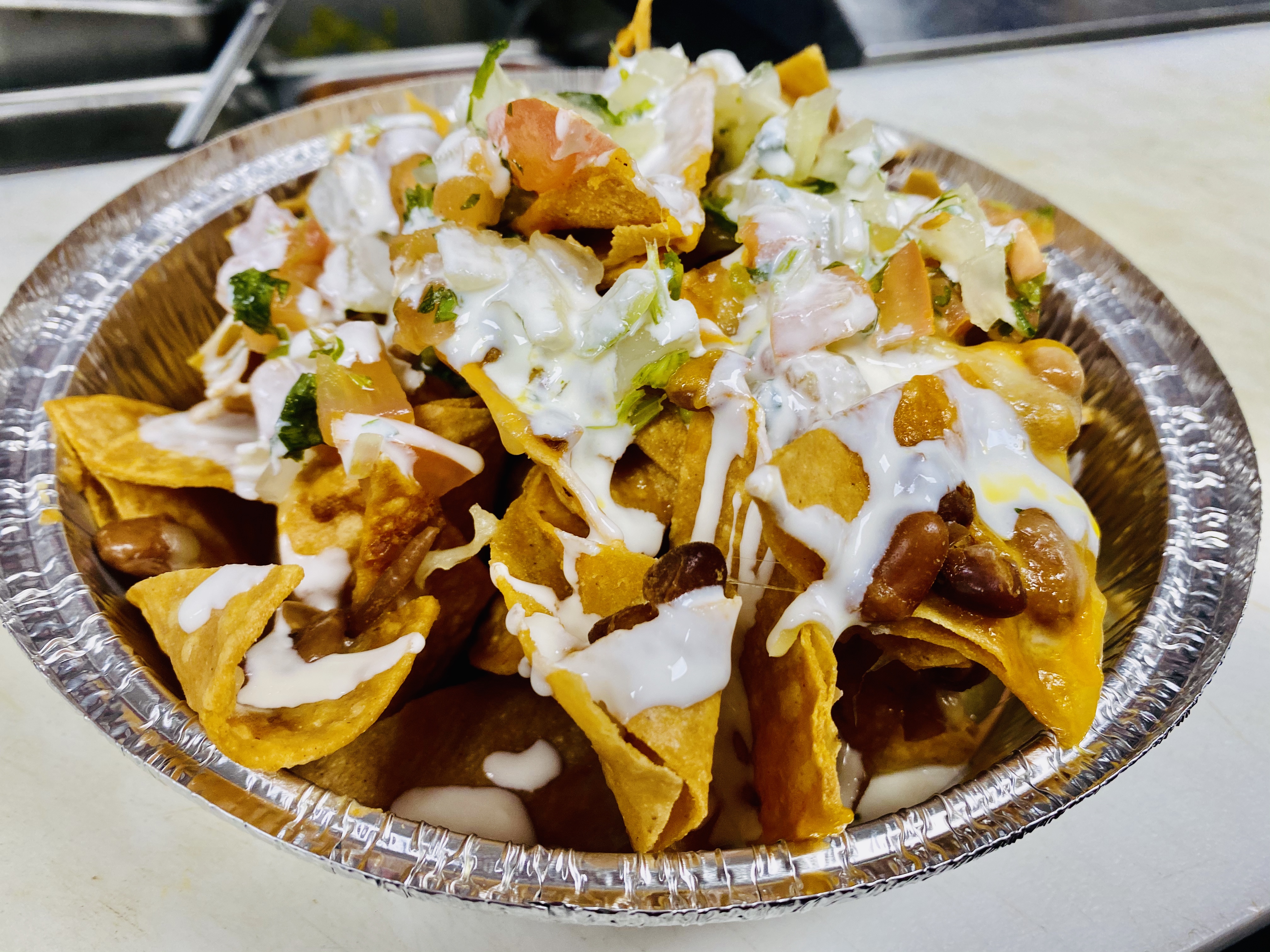 Order Nachos plain food online from Sabores Latinos Restaurant & Bakery Corp. store, Richmond Hill on bringmethat.com