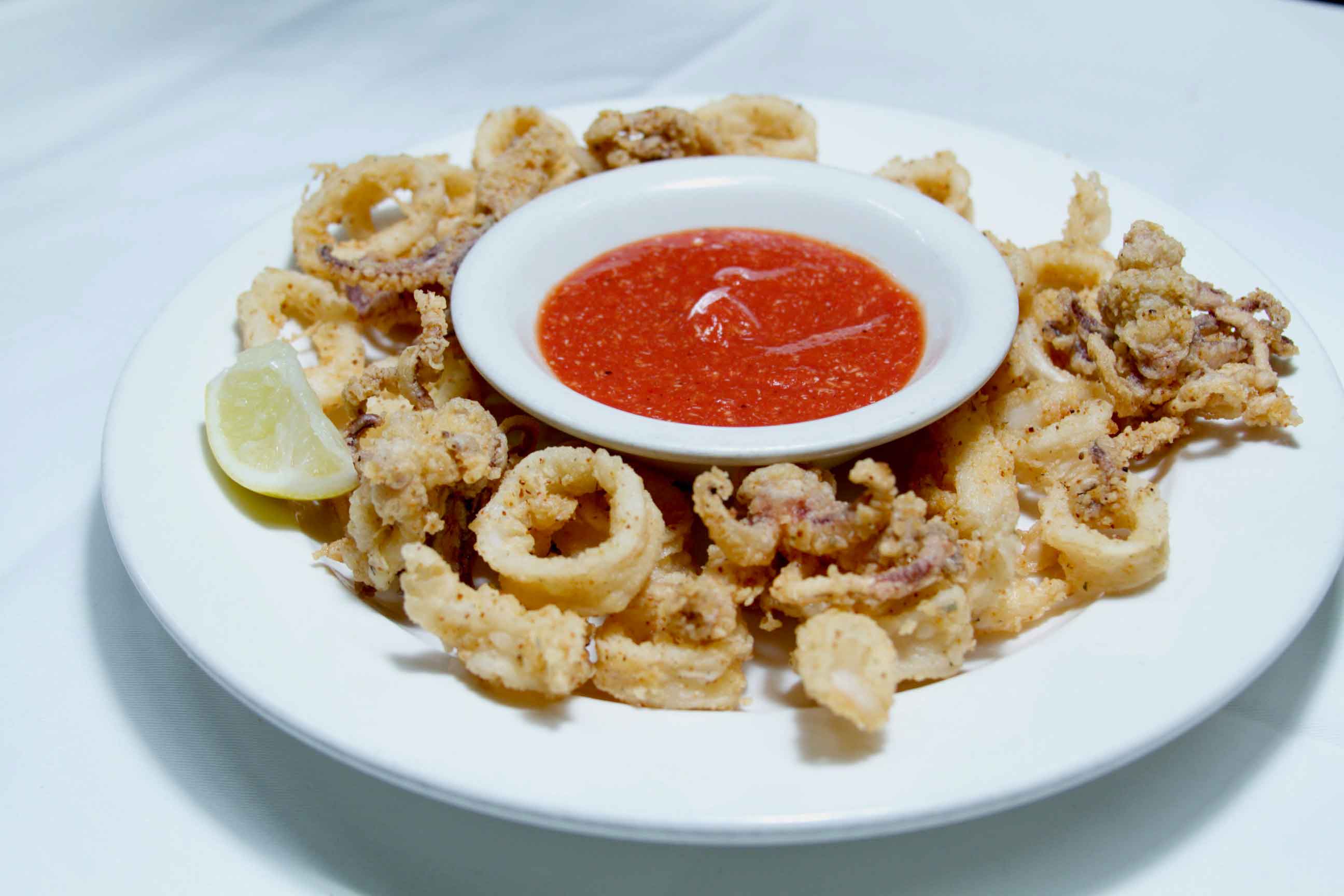 Order Fried Calamari food online from Hms Bounty store, Los Angeles on bringmethat.com
