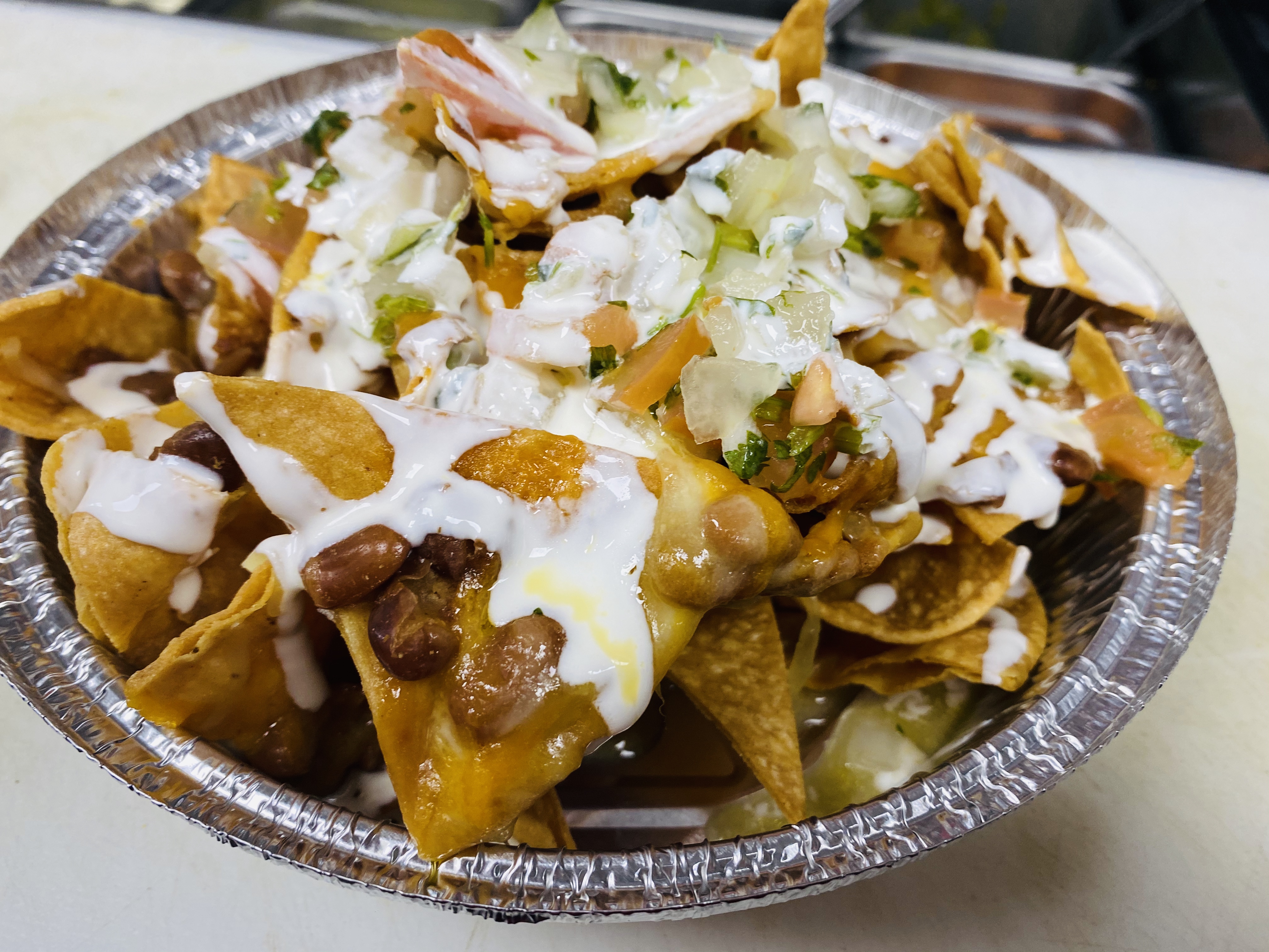 Order Nachos al Pastor food online from Sabores Latinos Restaurant & Bakery Corp. store, Richmond Hill on bringmethat.com