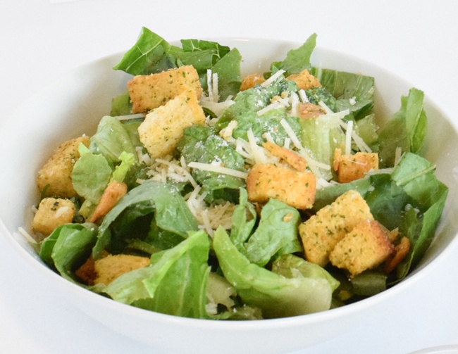 Order Side Caesar Side Salad food online from Hurricane Grill & Wings store, Syosset on bringmethat.com