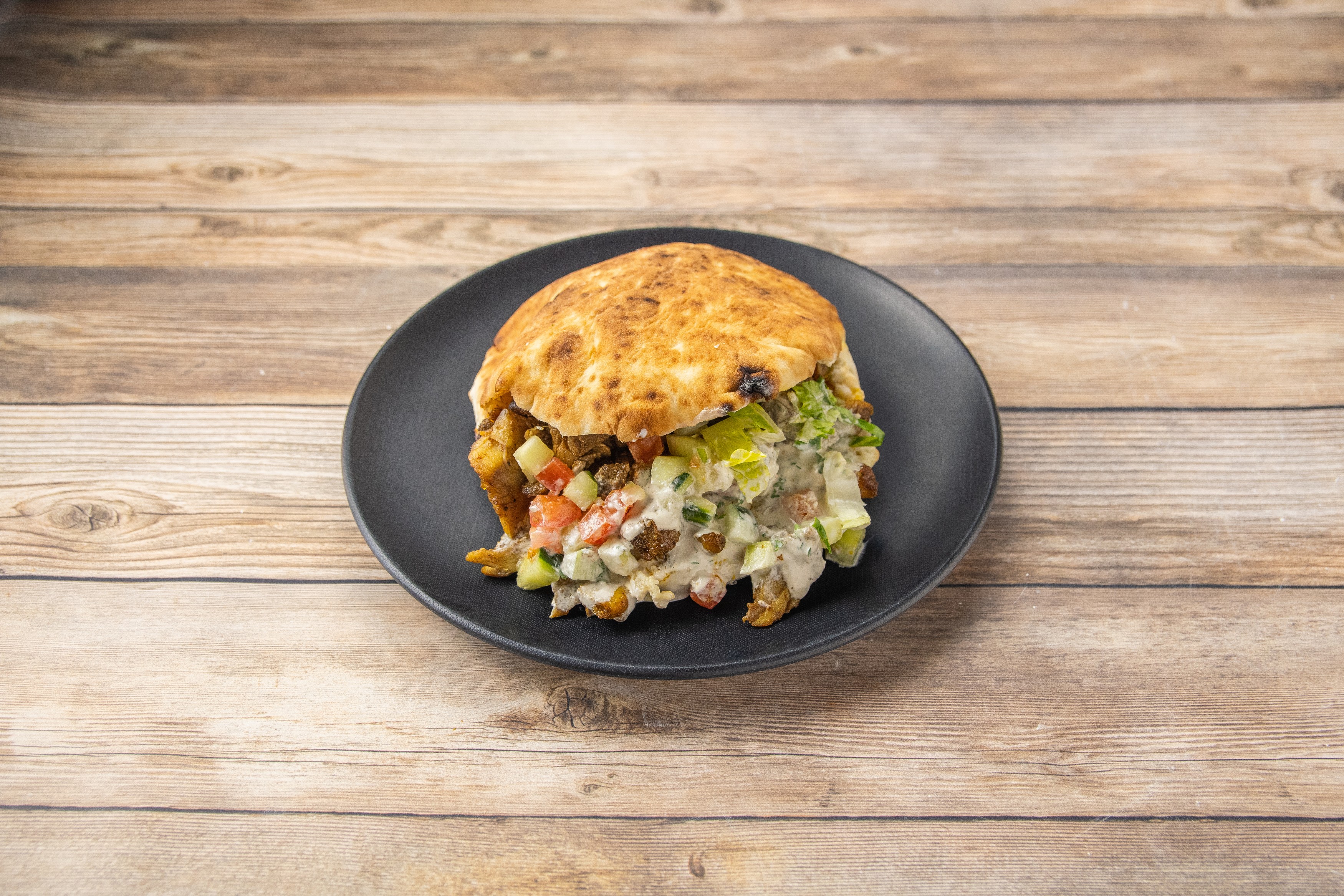 Order Chicken Shawarma in Pita food online from Kabab Burger store, Lafayette on bringmethat.com