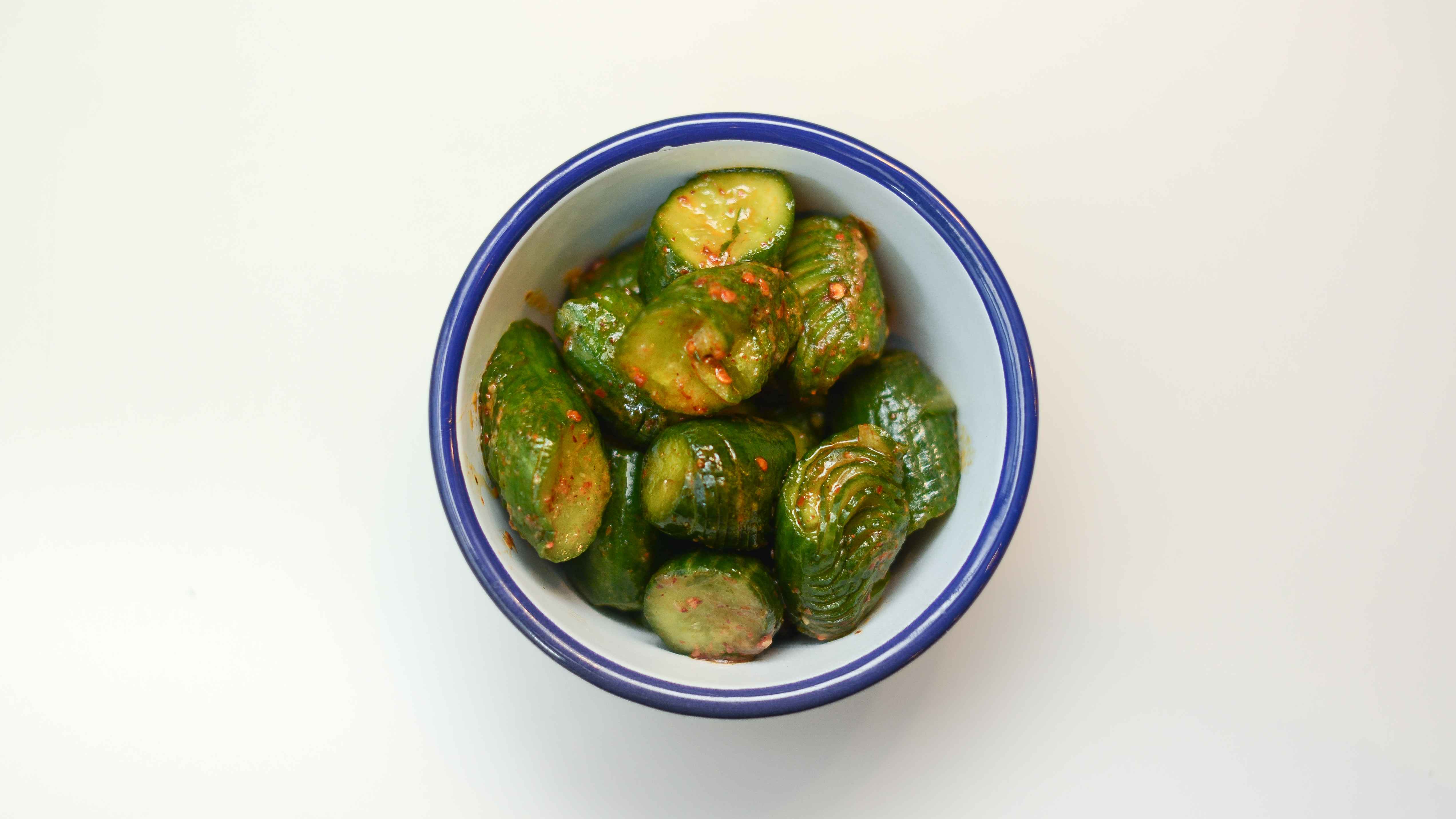 Order Marinated Cucumbers food online from Milu store, New York on bringmethat.com