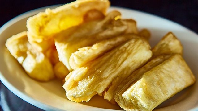 Order Yuca Frita food online from Riko Peruvian Cuisine store, Queens on bringmethat.com