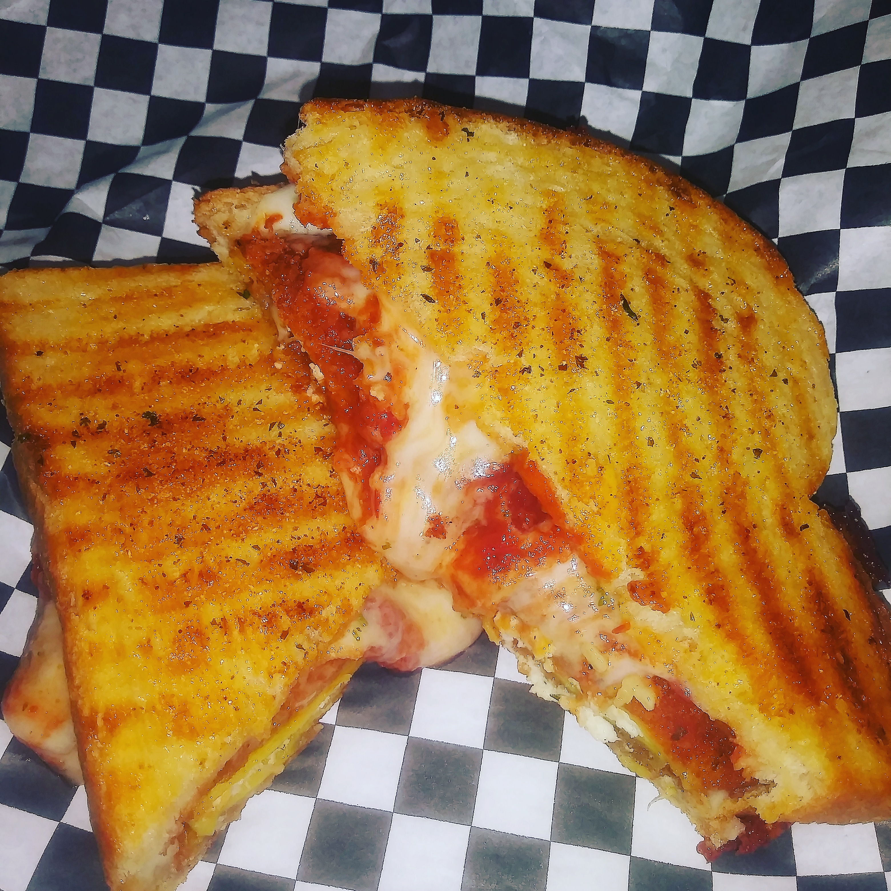 Order HOLY RAVIOLI MELT (veg) food online from The Grilled Cheese Factory store, Rochester on bringmethat.com