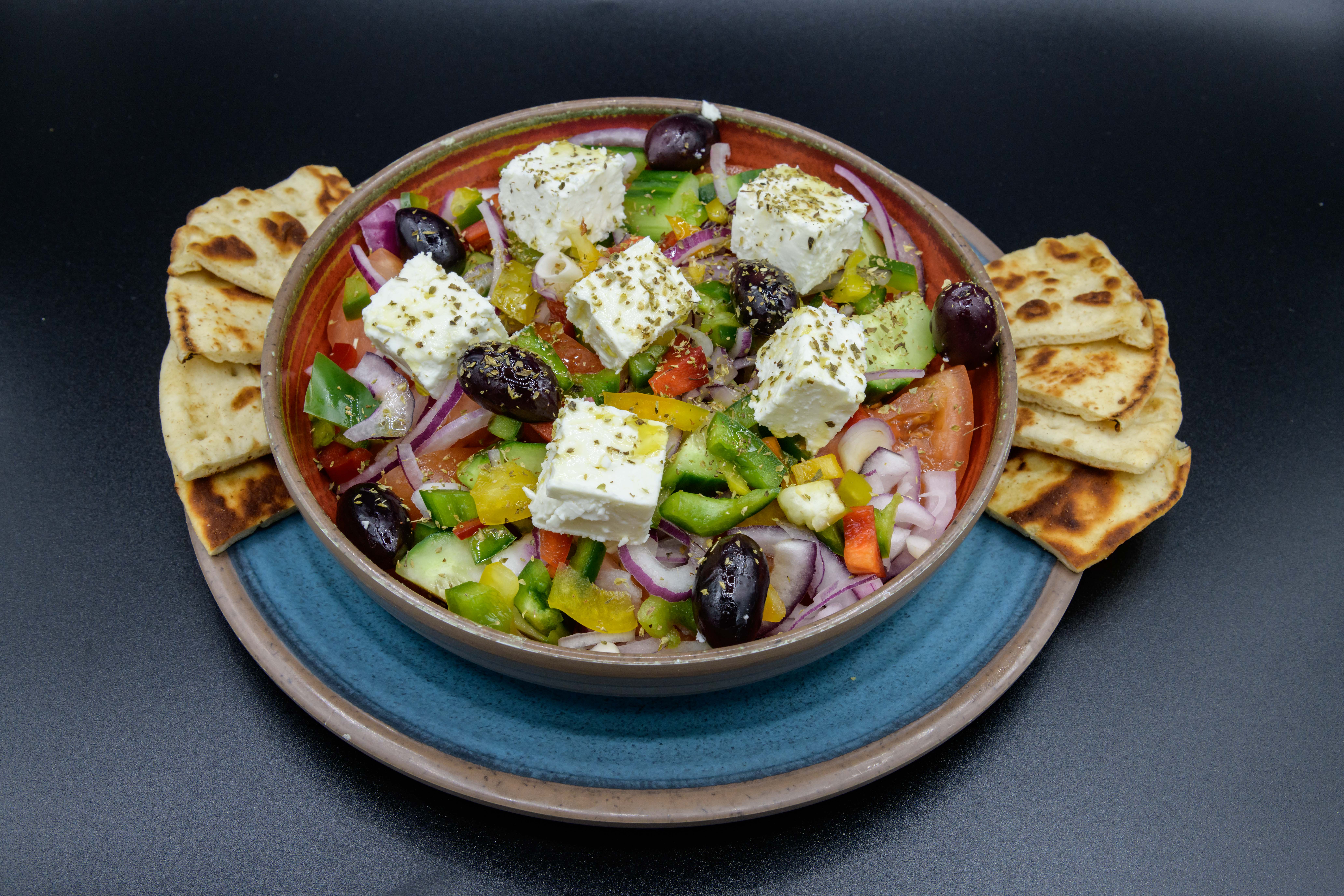 Order Horiatiki Salad food online from Gyro City store, Brighton on bringmethat.com
