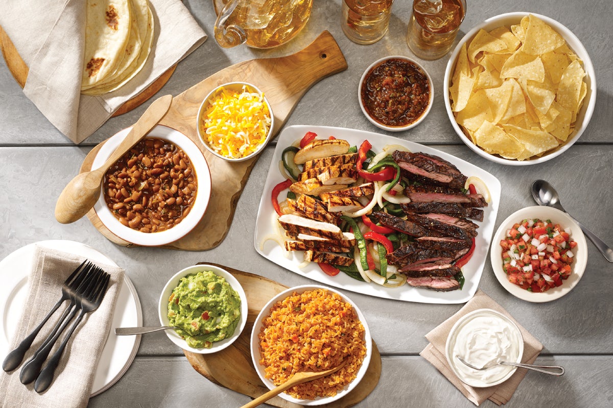 Order Family Fajita Meal for 4 food online from Uncle Julio's store, Brentwood on bringmethat.com