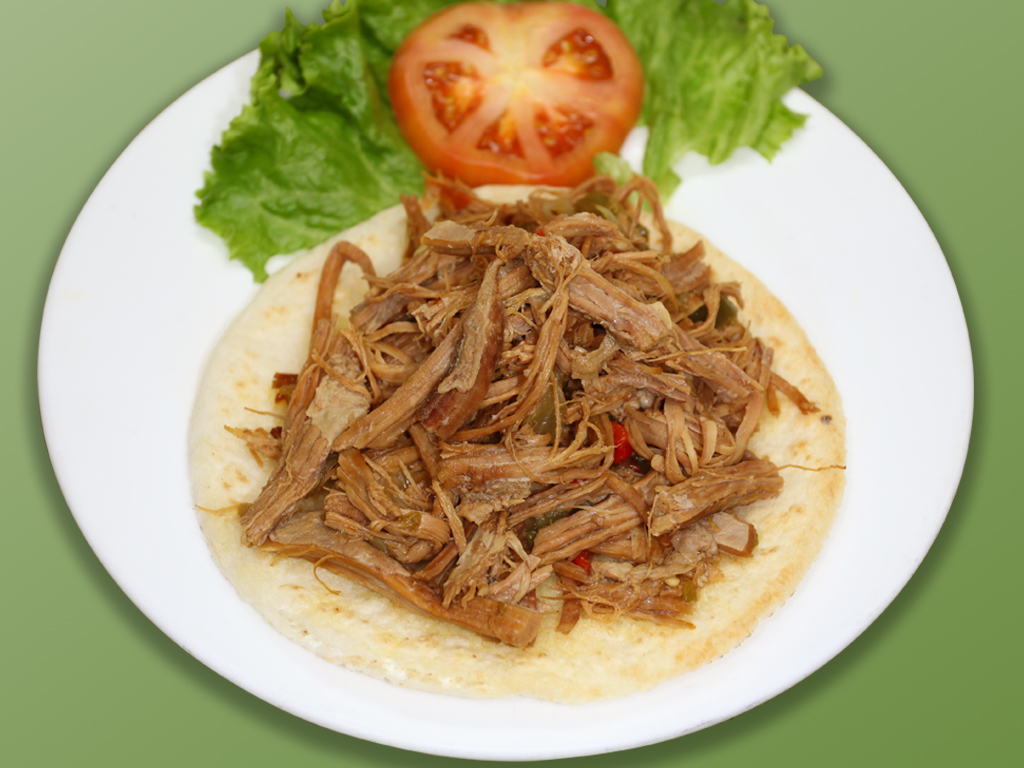 Order 44. Arepa con Carne Desmechada food online from Cositas Ricas Corp store, Queens on bringmethat.com